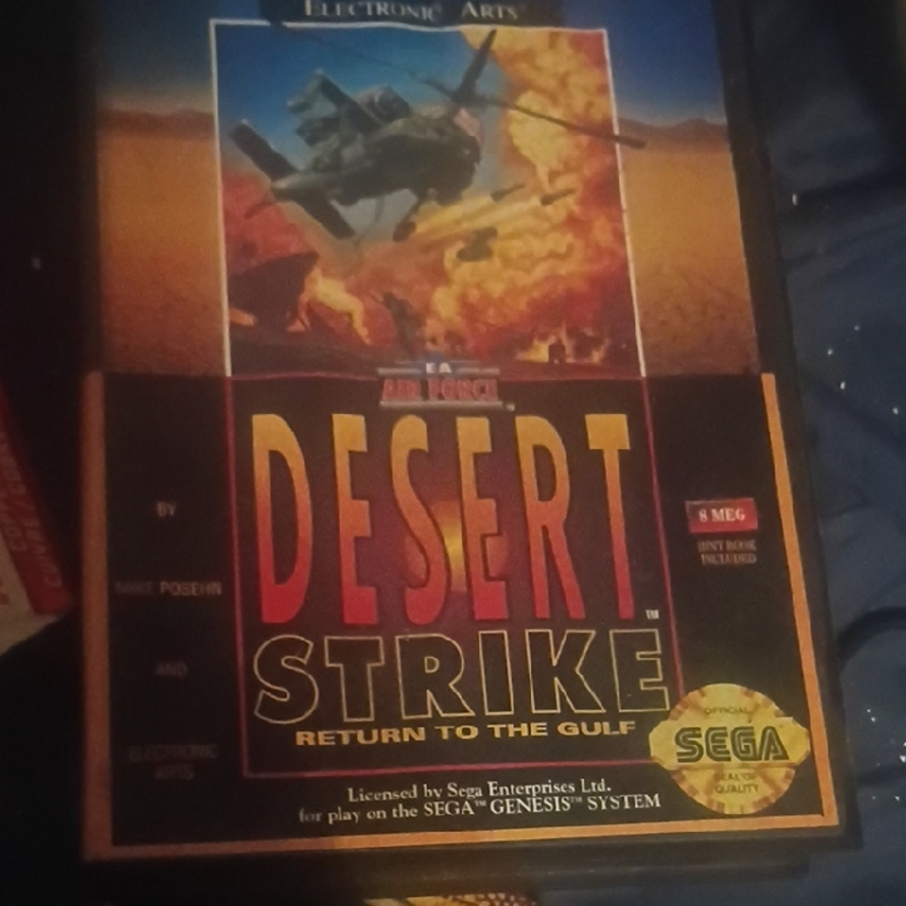 Sega Desert Strike Video Game - Black & Gold Cover